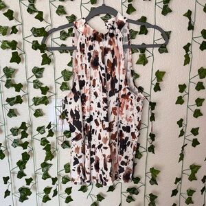 Jolie Abstract Print Sleeveless Blouse
